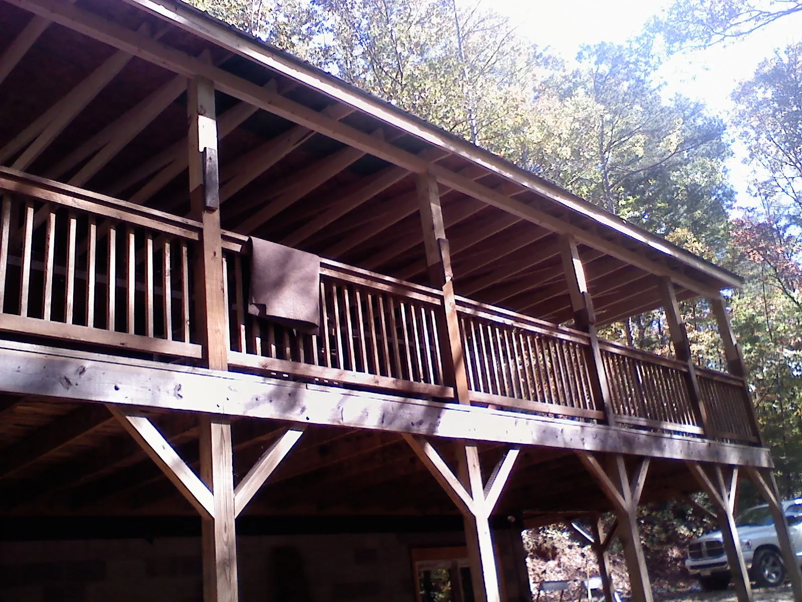 Timber framing under a new elevated porch and deck — Roof Leak Repair in Honeoye Falls by Roofing Brothers
